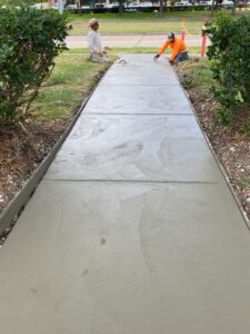 What Is The Process For Pouring A Commercial Concrete Sidewalk?